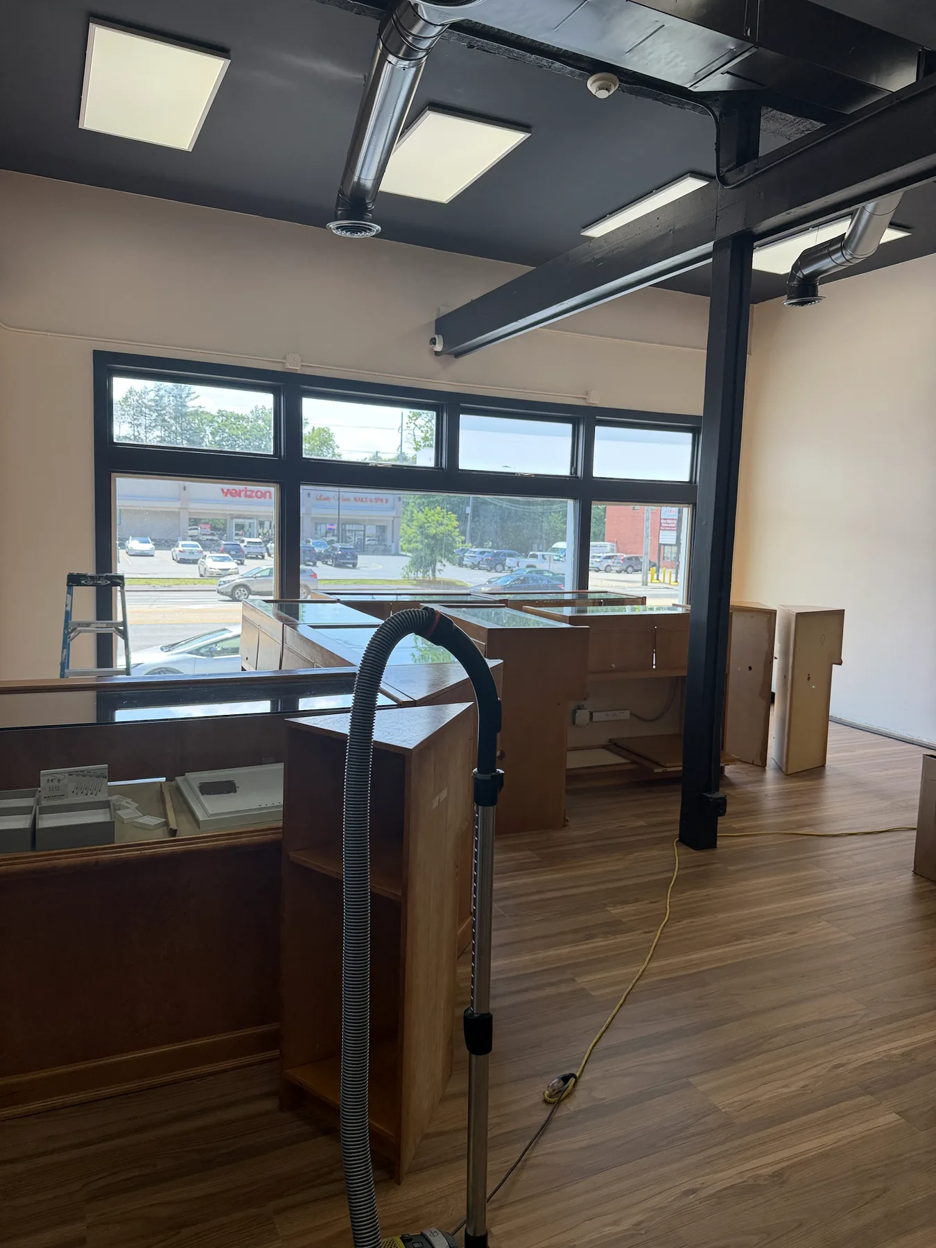A clean commercial showroom with maintained floor and bright customer-facing space