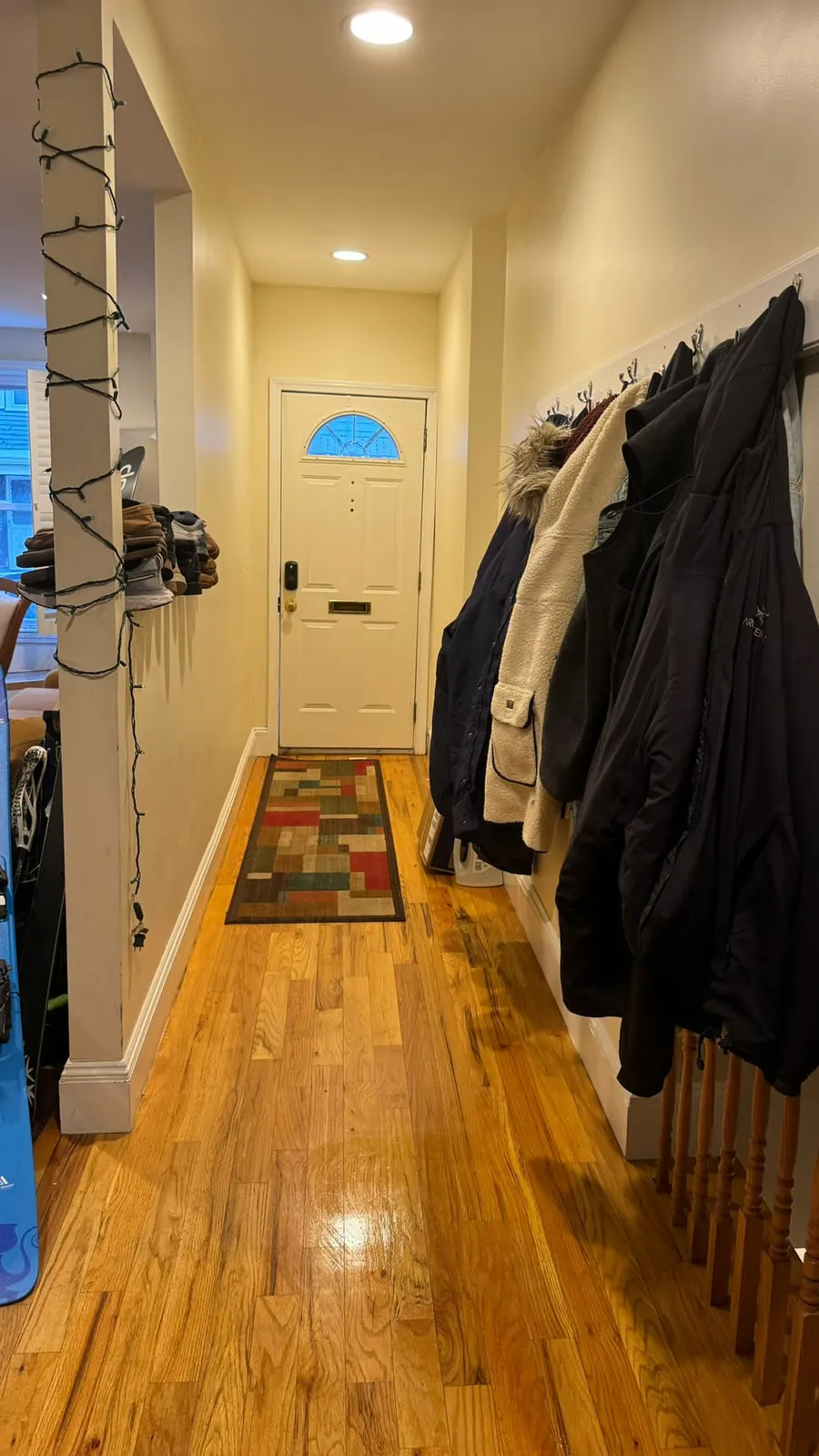 A finished hallway floor in a residential space, clean and brought back to order